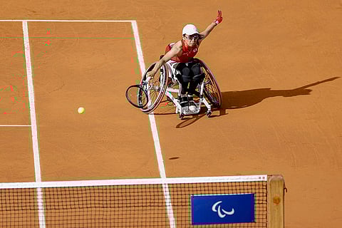 2024 Paris Paralympics: Japan's Momoko Ohtani chases a ball during wheelchair Tennis women's double quarter final